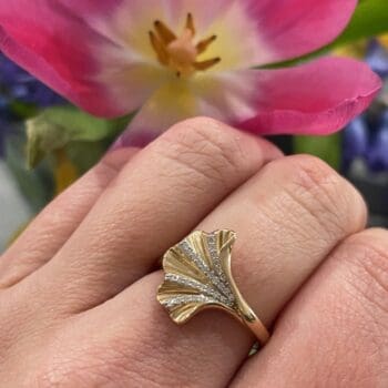 Ginkgo Diamond Ring on a hand for scale